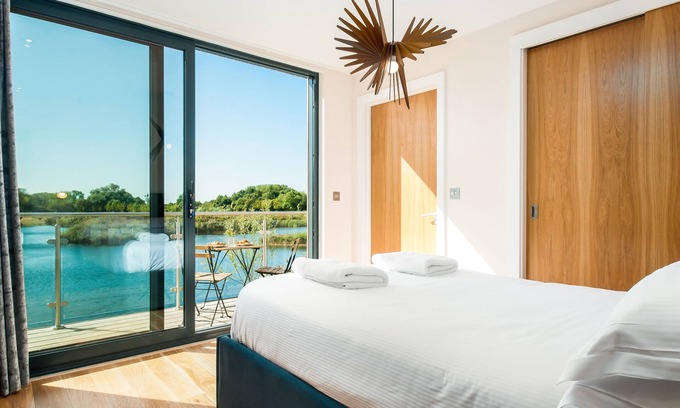Somerford Keynes House | Villa with direct lake access, hot tub, swimming pools, tennis & restaurant