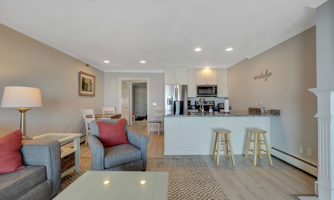 Boyne City Condo | Walk-Out to Lake Charlevoix | Private Beach & Balcony | Downtown Boyne City |