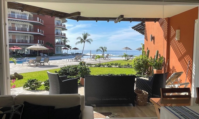Bajos de Chila Condo | Walk out to pool and ocean steps away.