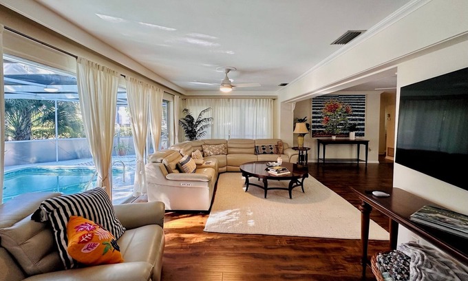 Coquina Sands House | Walk To Beach From Cottage-Style Home In The Heart of Naples