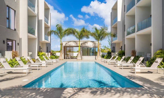 Grace Bay Apartment | Walk to Grace Bay- Stunning Pool Views ! Z-B303