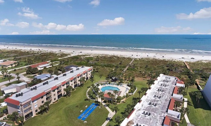 Butler Beach Condo | Walk To The Beach and Restaurants with Pools, Tennis and BBQ