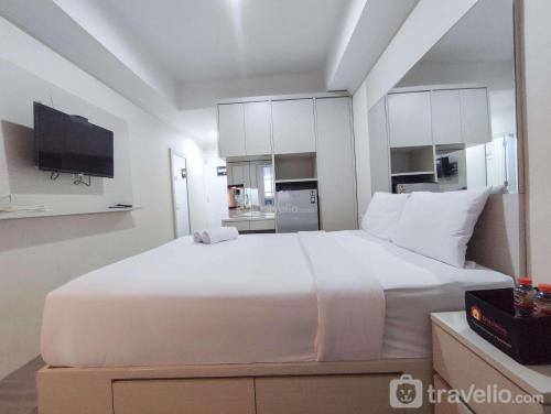 Jatingaleh Apartment | Warm and Cozy Style Studio Room at Paltrow City Apartment By Travelio