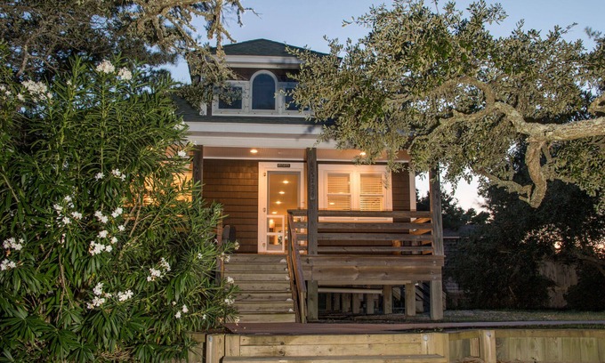 Waves Cottage | Waterfront 2-Bedroom, 1-Bathroom Cottage with a Hot tub and Waterfront Deck