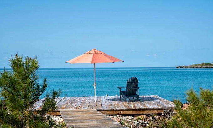 Governor's Harbour Cottage | Waterfront Cottage. Perfect Sunset and Swimming