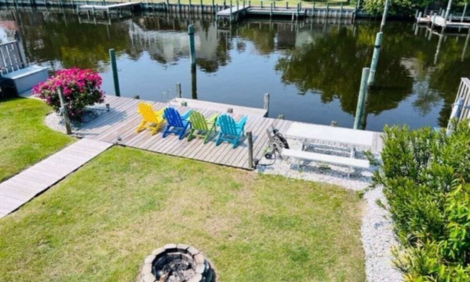 Colington Harbour House | Waterfront! Game Room, Hot Tub,Theater Room, Kayaks, SUPs, FirePit, YMCA! DogsOK