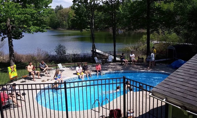 Interlochen House | Waterfront home in Lake Ann w/outdoor pool. Row boat, kayak, canoe. Dog ok,