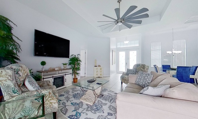 Trafalgar House | Waterfront home with private pool, dock, WiFi, central AC, and desk workspaces