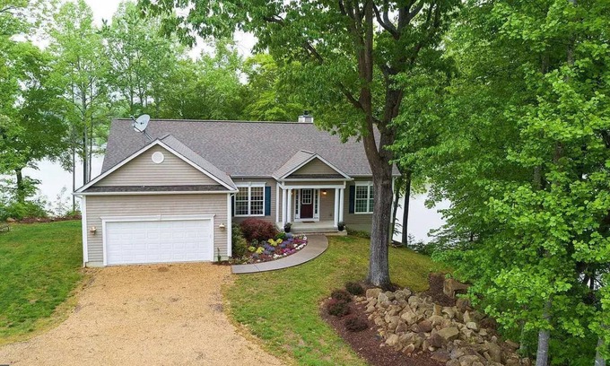 Orange House | Waterfront Oasis! Ready to Make a Splash?