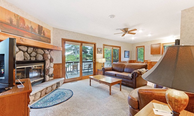 Eagle River Villa | Waterfront villa w/ fireplace, deck & shared tennis/game room - dogs welcome!