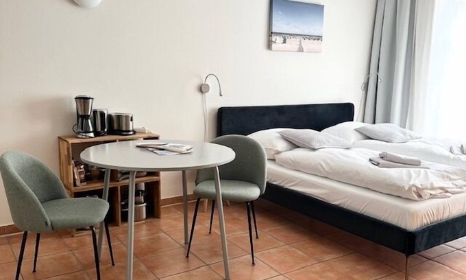 Warnemuende Apartment | Wave play, modern one-room apartment, quiet location, perfect for. 2 pers. - Atelier on the river