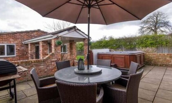 Huntington Other | Welcome to our exquisite 5-bedroom farmhouse.