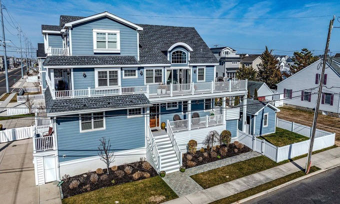 Avalon House | Welcome to your dream vacation home in the heart of Avalon! This stunning 7-bedroom home with POOL.