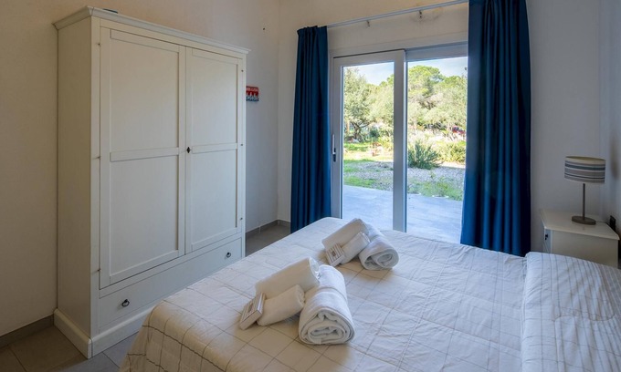 Cala Liberotto Apartment | Welcomely - Porto Corallo Seafront