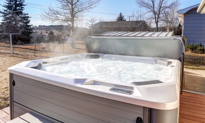 Rapid City House | Westside Charm w/enclosed yard, hot tub, quiet locale, rec room, elliptical