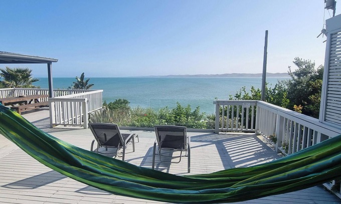 Raglan House | WHALE BAY COASTAL RETREAT - Your luxury surf front stay for up to 13 guests