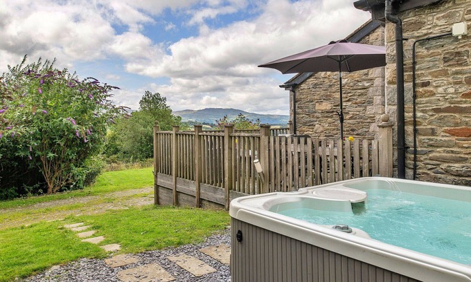 Eglwysbach House | Wonderful villa for 4 guests with hot tub, WIFI, terrace and pets allowed