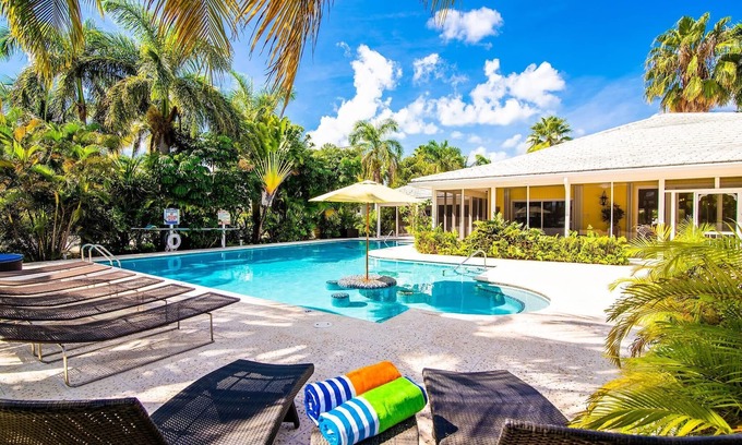 Rum Point Villa | Yippee Kai Eh! @ Rum Point - A Villa with Heated Pool & Dock