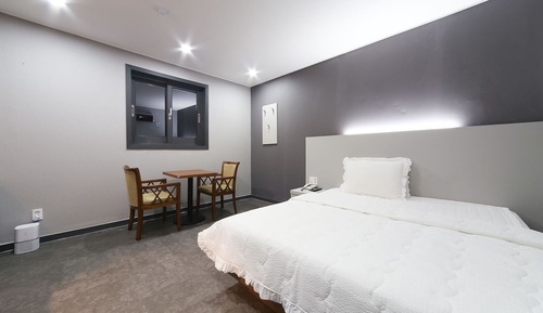 Room (One parking space per room)