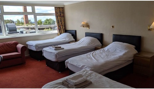 Standard Quadruple Room (4 single beds)