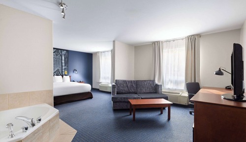 Upgraded, Suite, 1 King Bed with Sofa bed