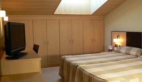 Double Room (Lofted Ceiling, 2 Adults + 1 Child)