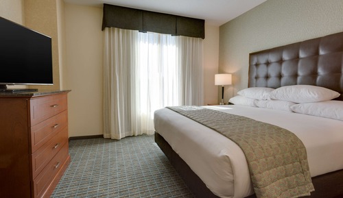 Suite, 1 King Bed, Refrigerator & Microwave (2 rooms, Sofa Bed, Upper Floor)