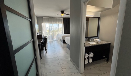Family Room, 2 Queen Beds, Balcony, Pool View