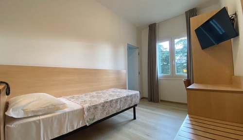 Basic Single Room, Balcony, Garden View