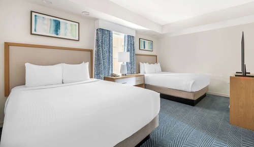 2 BEDROOM 1 KING 2 QUEEN SUITE HEARING ACCESS