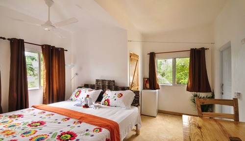 Mango Bedroom with shared Kitchen and Terrace 