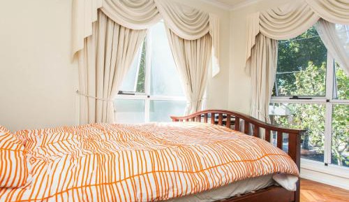 Queen Room with Shared Bathroom