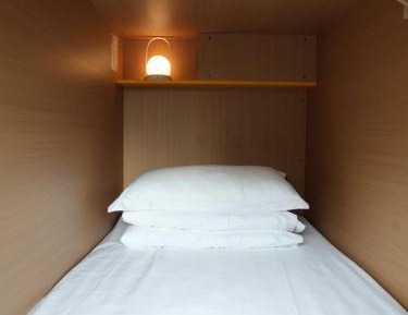 Single Bed in Female Dormitory Room