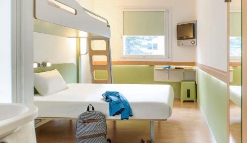 Room with One Queen Bed and One Bunk Bed