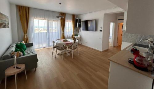 Three-Bedroom Apartment with Harbor View