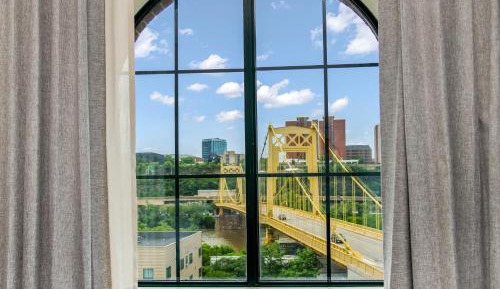 Queen Suite with Two Queen Beds and Sofa Bed