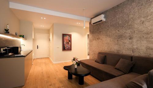 One-Bedroom Apartment with Balcony and City View
