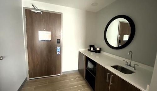 Two Room Suite with One King and Two Queen Beds