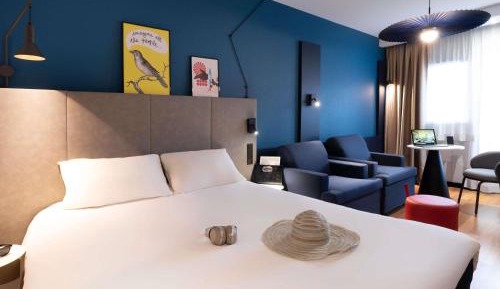 Classic Family Room with one queen bed and two sofa beds.