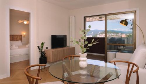 One-Bedroom Apartment with Balcony and Sea View