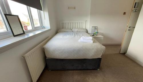 Queen Room with Shared Bathroom