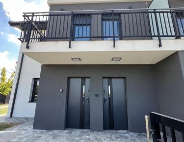 Two-Bedroom Apartment with Balcony