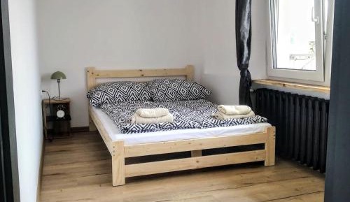Four-Bedroom Apartment with Balcony 