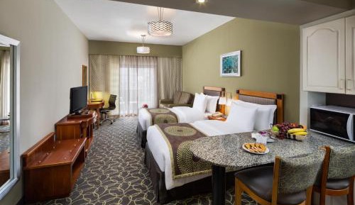 Classic Studio Suite with Complimentary Shuttle to La Mer Beach (inclusive of Beach Mats & Beach Towels), BurJuman Mall and Outlet Mall