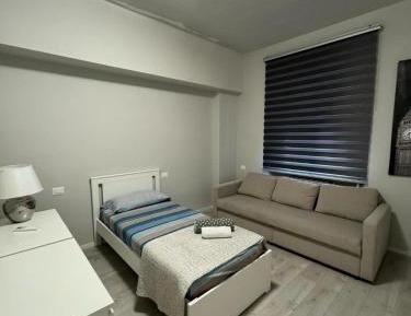Three-Bedroom Apartment with Balcony