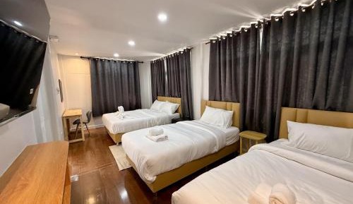 Deluxe Quadruple Room with Balcony