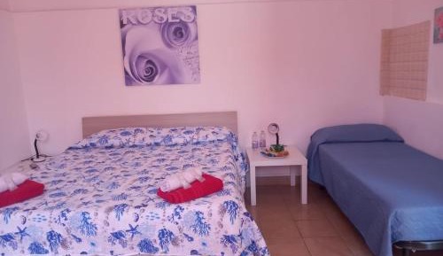 Quadruple Room with Private Bathroom