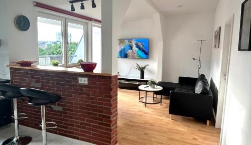 Four-Bedroom Apartment with Balcony 