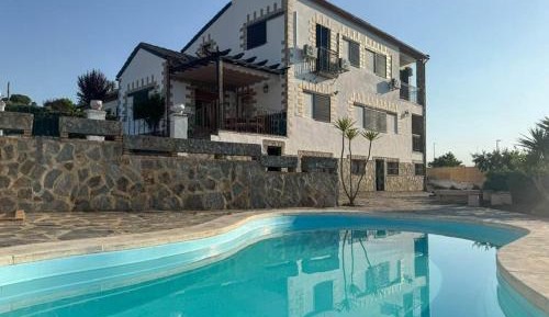 Six-Bedroom House