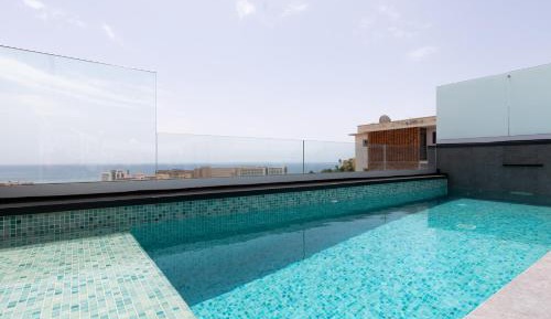 Three-Bedroom Apartment with Sea View